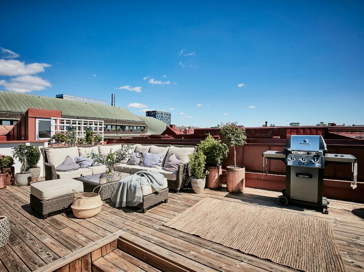 Terraza de madera en el tejado | delikatissen